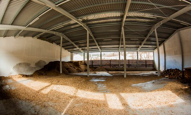 A storage facility for wood chips.